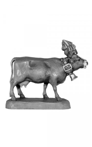 Cow with alpine decoration, looking ahead