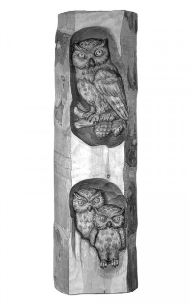 Three owls in relief